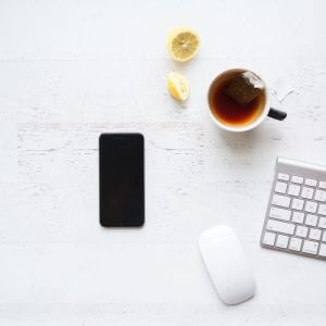 picture of a cell phone, cup of tea, and laptop computer ready to contact Toronto Naturopath Dr. Pamela Frank
