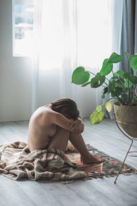 Picture of a woman with painful cystitis or bladder infection or urinary tract infection