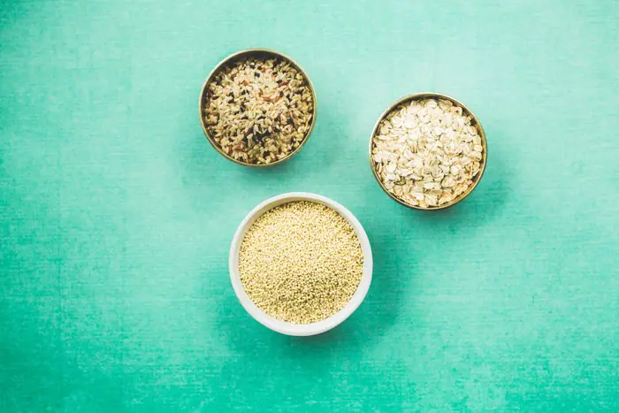 Consuming Grains: Are They Even Human Food? picture of 3 bowls containing grains. Are these grains healthy to eat?