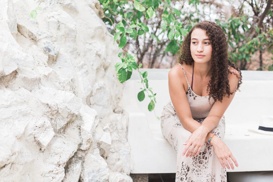 picture of a seated woman thinking about how to have resilience and cultivate a pcos mindset
